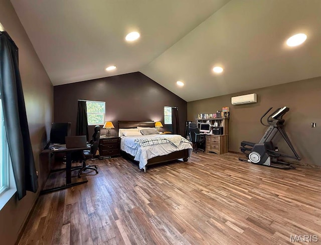 10185 Springer Dr, Bonne Terre, MO 63628 - bedroom with wood finished floors, lofted ceiling, a wall unit AC, and recessed lighting