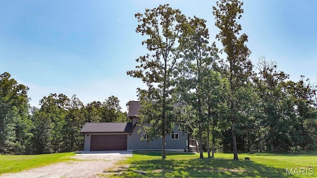 10185 Springer Dr, Bonne Terre, MO 63628 - view of front of home featuring a garage, a front yard, and driveway