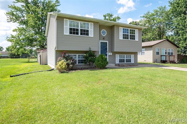 221 James St, Bethalto, IL 62010 - raised ranch with a front lawn
