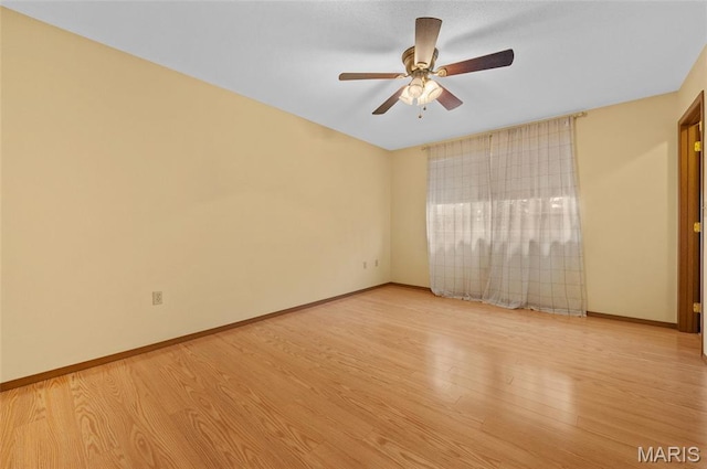 221 James St, Bethalto, IL 62010 - unfurnished room with ceiling fan and light wood finished floors