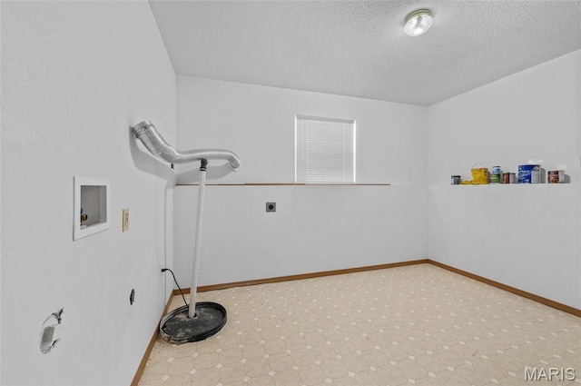 221 James St, Bethalto, IL 62010 - washroom with hookup for a washing machine, a textured ceiling, and hookup for an electric dryer