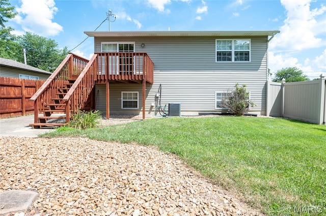 221 James St, Bethalto, IL 62010 - back of house featuring stairs, a fenced backyard, and a wooden deck