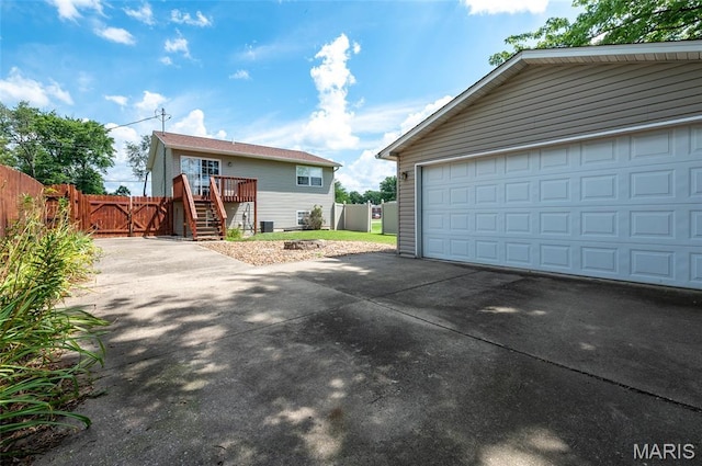 221 James St, Bethalto, IL 62010 - view of front of property featuring stairs, a deck, and an outdoor structure
