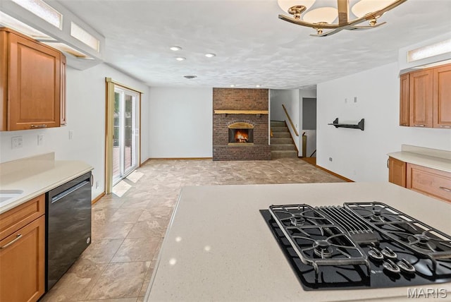 46 Coronation Dr, Millstadt, IL 62260 - kitchen featuring black gas cooktop, dishwashing machine, light countertops, recessed lighting, and open floor plan