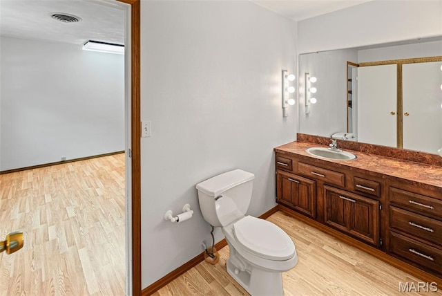 46 Coronation Dr, Millstadt, IL 62260 - bathroom featuring vanity and wood finished floors