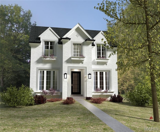 8145 University Dr, Clayton, MO 63105 - view of front of property with a front lawn and brick siding