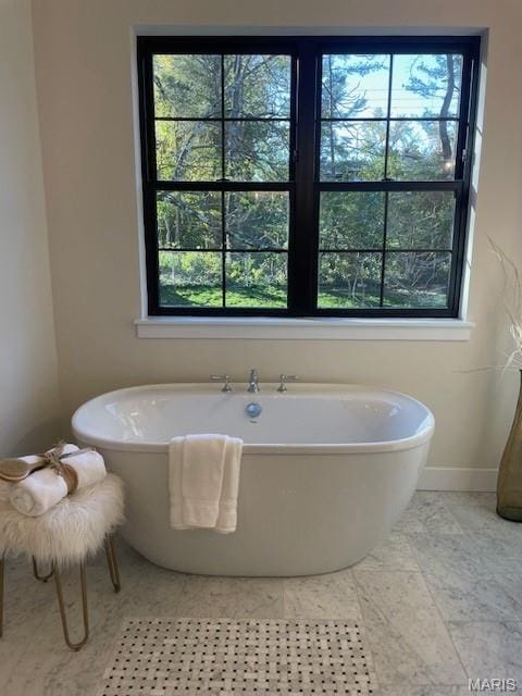 8145 University Dr, Clayton, MO 63105 - bathroom with a freestanding tub