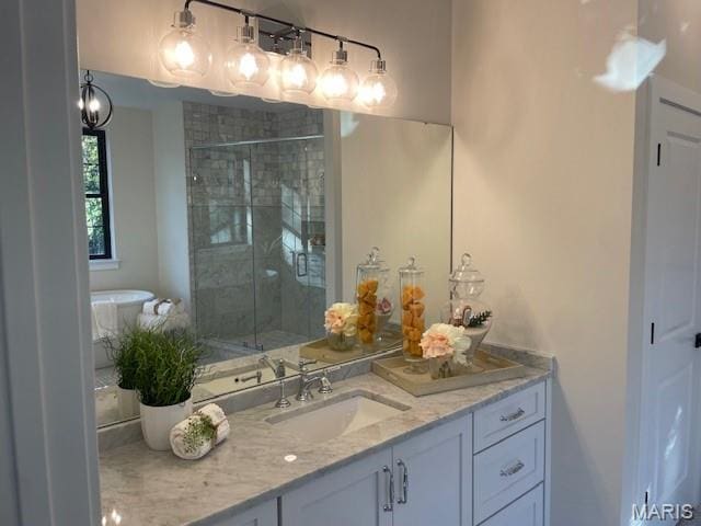 8145 University Dr, Clayton, MO 63105 - full bathroom featuring vanity and a shower stall