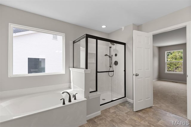 2213 Rule Ave, Maryland Heights, MO 63146 - full bathroom with a garden tub and a shower stall