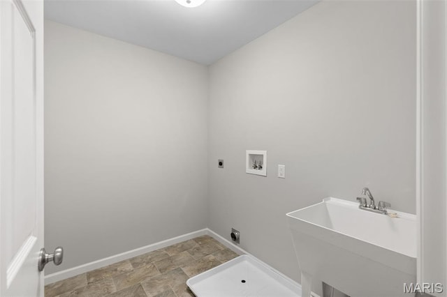 2213 Rule Ave, Maryland Heights, MO 63146 - laundry area featuring electric dryer hookup, hookup for a washing machine, and stone finish floors