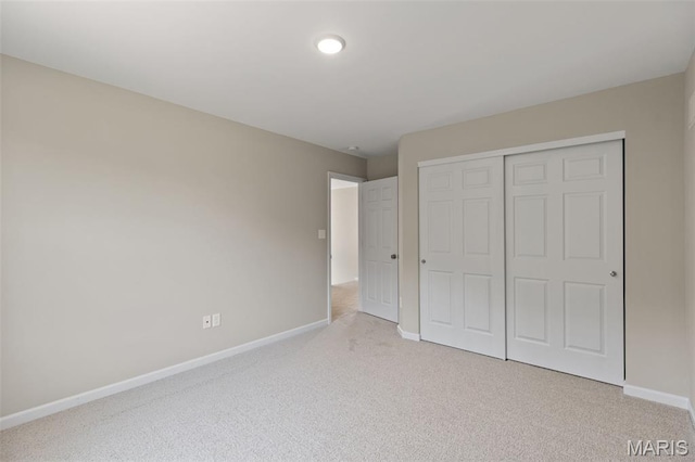 2213 Rule Ave, Maryland Heights, MO 63146 - unfurnished bedroom featuring carpet and a closet