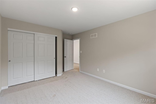2213 Rule Ave, Maryland Heights, MO 63146 - unfurnished bedroom with light colored carpet and a closet