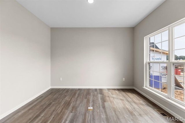 2213 Rule Ave, Maryland Heights, MO 63146 - spare room with wood finished floors and recessed lighting