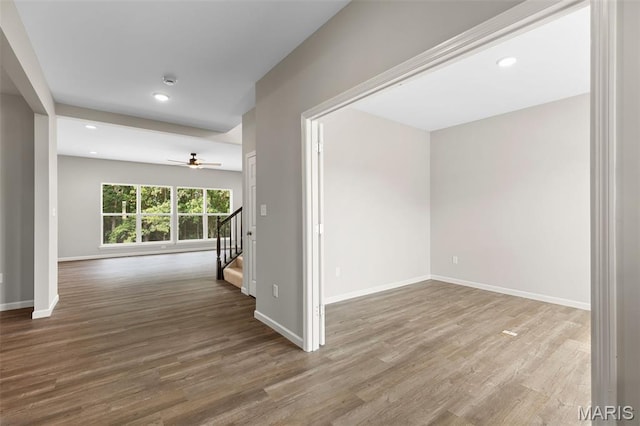 2213 Rule Ave, Maryland Heights, MO 63146 - empty room with stairway, wood finished floors, a ceiling fan, and recessed lighting