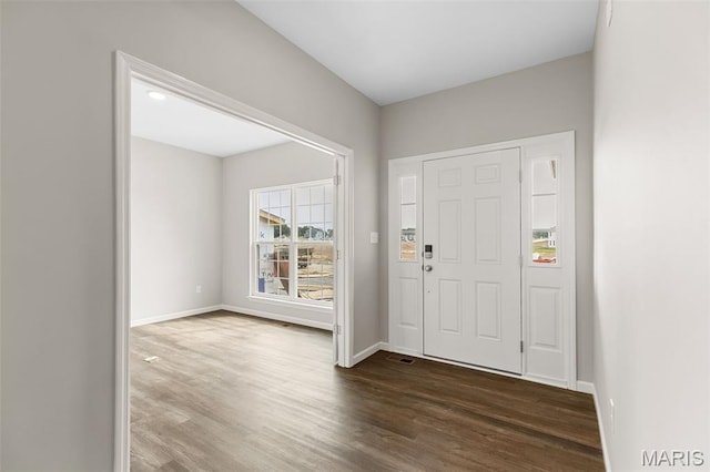 2213 Rule Ave, Maryland Heights, MO 63146 - foyer entrance with dark wood-style flooring and baseboards