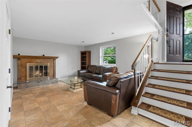 15 Ann Dr, Saint Peters, MO 63376 - living area featuring stairs and a tile fireplace
