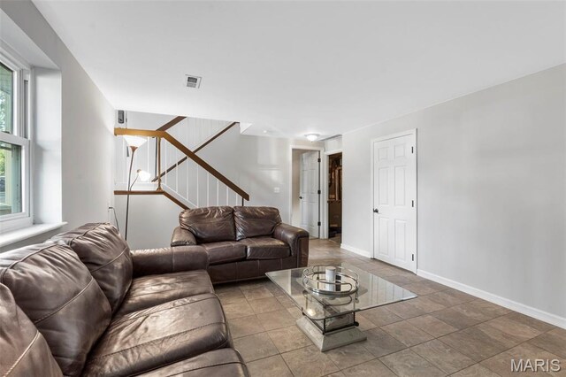 15 Ann Dr, Saint Peters, MO 63376 - living room featuring baseboards and stairs