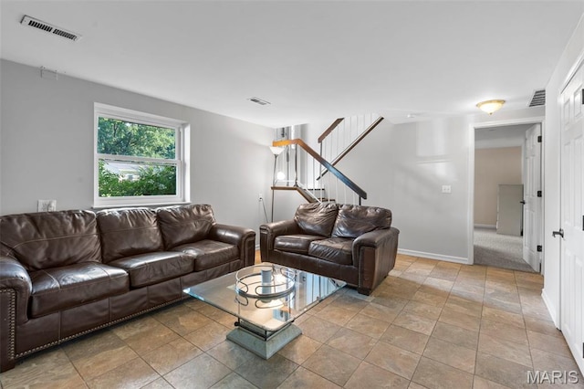 15 Ann Dr, Saint Peters, MO 63376 - living room with stairway and light stone finish flooring
