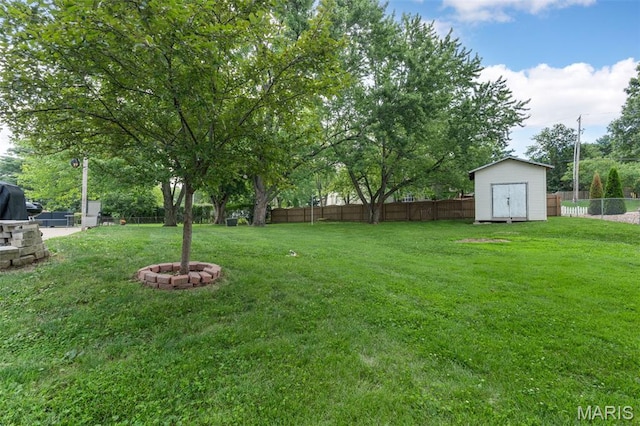 15 Ann Dr, Saint Peters, MO 63376 - fenced backyard with a storage unit