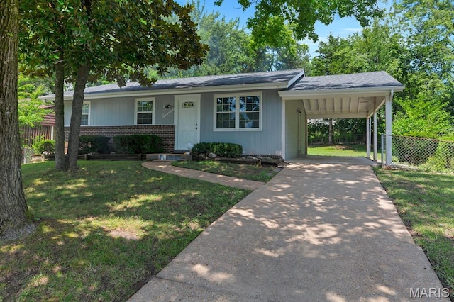 17 Edward Dr, Saint Peters Township, MO 63304 - view of front of property featuring driveway, an attached carport, and brick siding