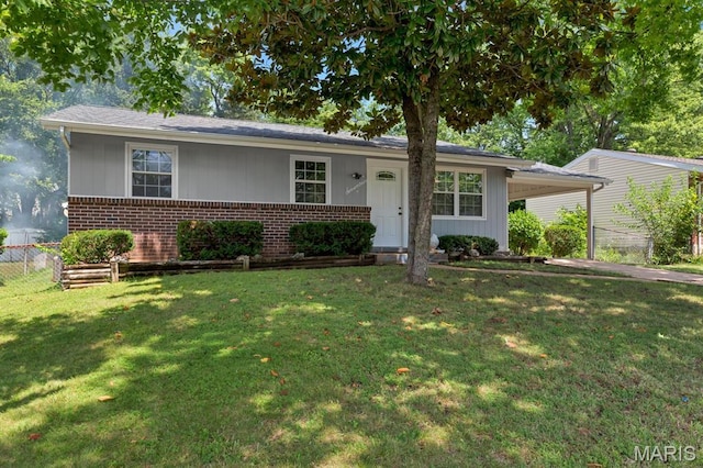 17 Edward Dr, Saint Peters Township, MO 63304 - ranch-style home with brick siding, a carport, and driveway