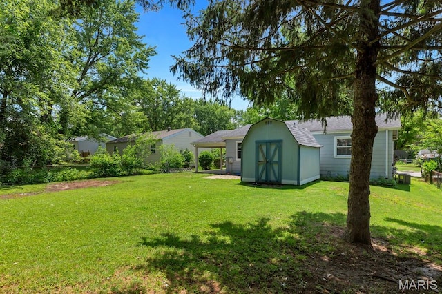 17 Edward Dr, Saint Peters Township, MO 63304 - view of green lawn featuring a shed and an attached carport