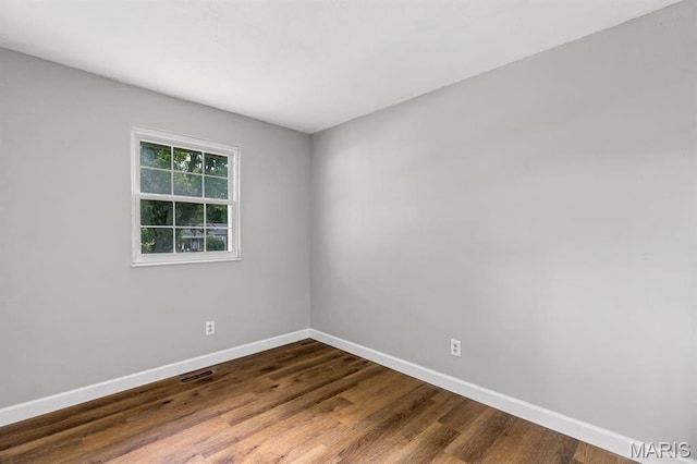 17 Edward Dr, Saint Peters Township, MO 63304 - unfurnished room featuring dark wood-style flooring