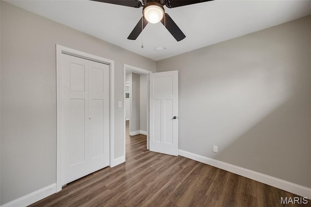229 Orchard Ave, Ballwin, MO 63021 - unfurnished bedroom featuring wood finished floors, a closet, and ceiling fan