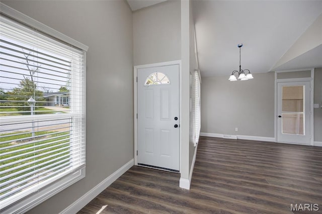 229 Orchard Ave, Ballwin, MO 63021 - entrance foyer with a chandelier, dark wood-type flooring, and high vaulted ceiling