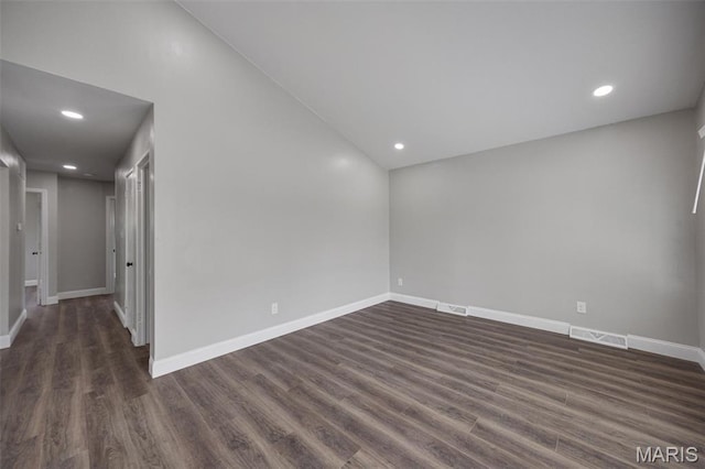 229 Orchard Ave, Ballwin, MO 63021 - unfurnished room featuring dark wood-type flooring and recessed lighting