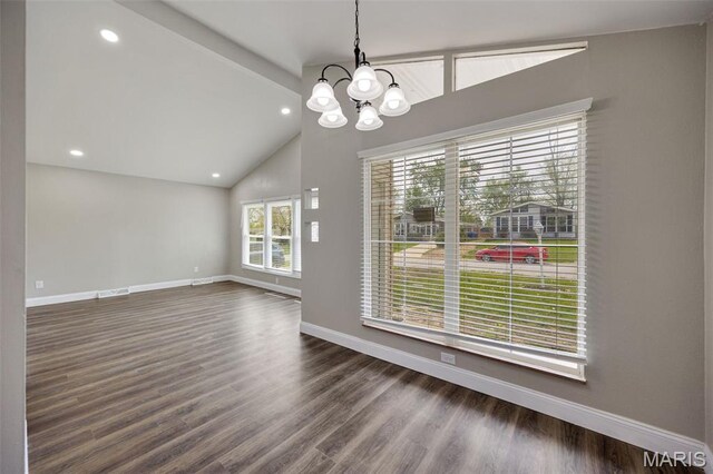 229 Orchard Ave, Ballwin, MO 63021 - unfurnished dining area featuring a chandelier, dark wood-style flooring, high vaulted ceiling, and recessed lighting