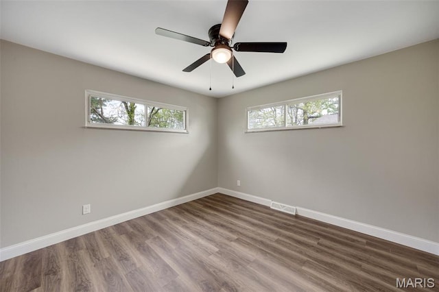 229 Orchard Ave, Ballwin, MO 63021 - unfurnished room featuring wood finished floors and a ceiling fan