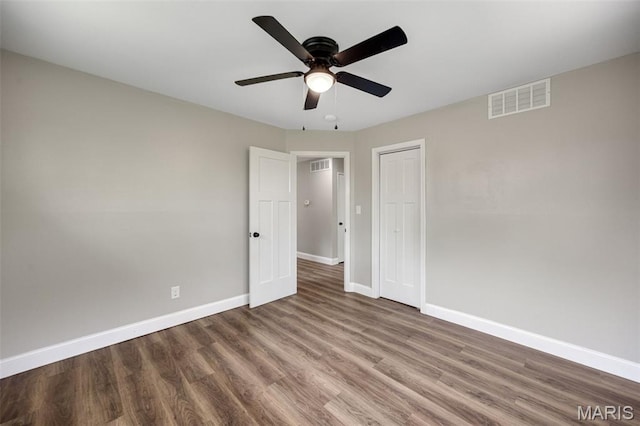 229 Orchard Ave, Ballwin, MO 63021 - unfurnished bedroom with wood finished floors, a closet, and a ceiling fan