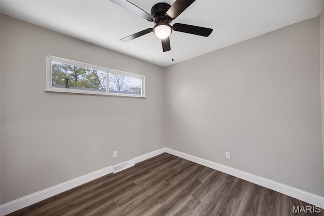 229 Orchard Ave, Ballwin, MO 63021 - empty room featuring dark wood-type flooring and a ceiling fan