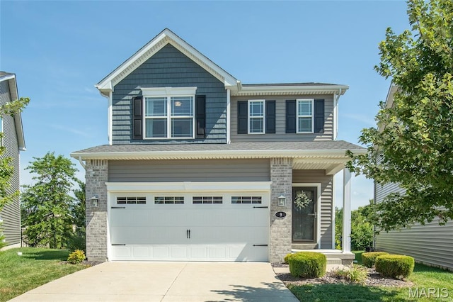 9 Vera Pl, Saint Charles, MO 63303 - view of front facade featuring concrete driveway and a garage