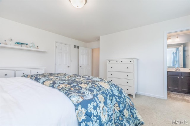9 Vera Pl, Saint Charles, MO 63303 - bedroom with light carpet and ensuite bathroom