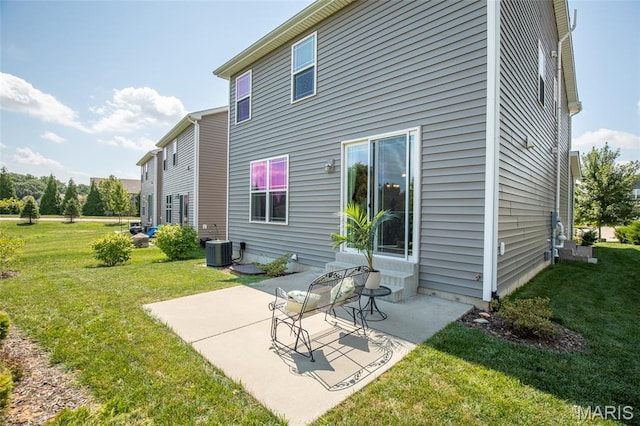 9 Vera Pl, Saint Charles, MO 63303 - back of house with a patio and a lawn