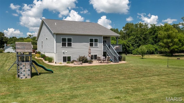 1145 Nassau Dr, Edwardsville, IL 62025 - rear view of property featuring stairway, a yard, a patio, a playground, and a deck