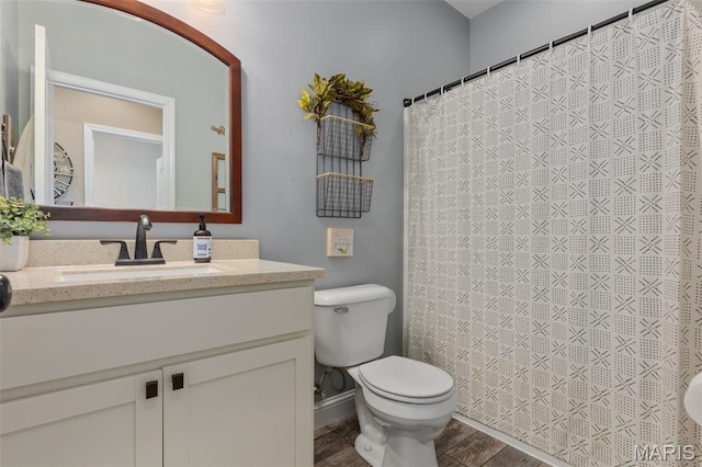 1145 Nassau Dr, Edwardsville, IL 62025 - full bath featuring vanity, wood finished floors, and curtained shower