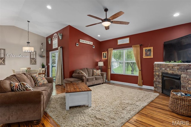 1145 Nassau Dr, Edwardsville, IL 62025 - living room with lofted ceiling, wood finished floors, a ceiling fan, healthy amount of natural light, and recessed lighting