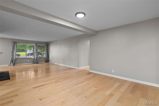 7315 Ahern Ave, University City, MO 63130 - unfurnished living room with wood finished floors