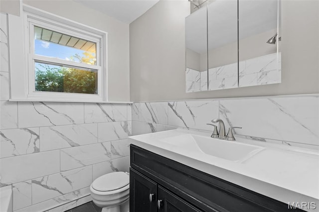 7315 Ahern Ave, University City, MO 63130 - bathroom featuring vanity and tile walls