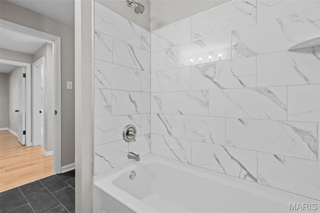 7315 Ahern Ave, University City, MO 63130 - full bathroom with bathtub / shower combination and baseboards