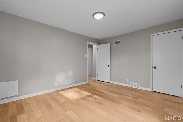 7315 Ahern Ave, University City, MO 63130 - unfurnished bedroom featuring light wood-style floors