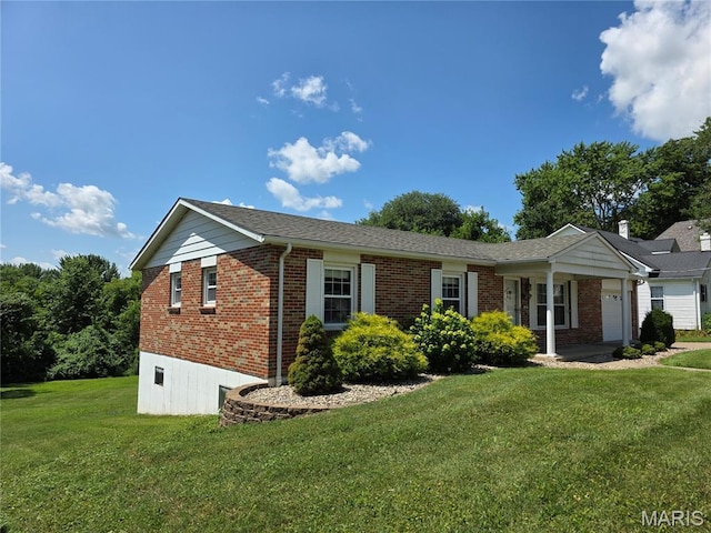 320 W 6th St, Washington, MO 63090 - ranch-style home featuring brick siding, a front yard, and a garage