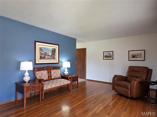 320 W 6th St, Washington, MO 63090 - living room with wood finished floors and baseboards
