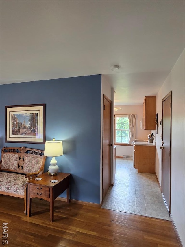 320 W 6th St, Washington, MO 63090 - corridor featuring light wood-type flooring and baseboards