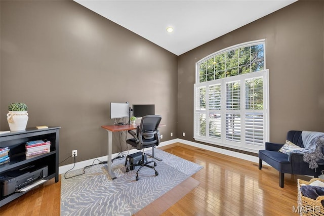 1304 Forest Way, Wentzville, MO 63385 - office featuring high vaulted ceiling, wood finished floors, and recessed lighting