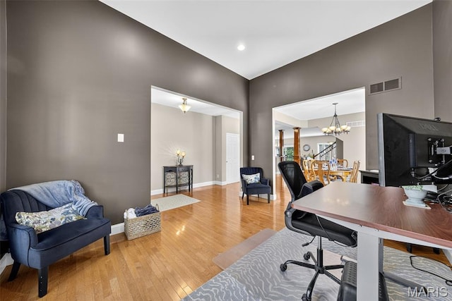 1304 Forest Way, Wentzville, MO 63385 - home office with light wood-style floors and a chandelier
