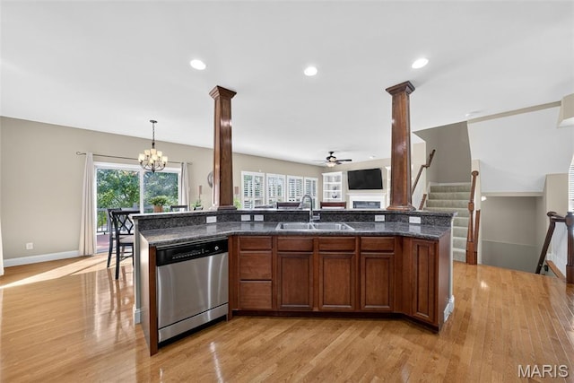 1304 Forest Way, Wentzville, MO 63385 - kitchen with dishwasher, ceiling fan, ornate columns, a chandelier, and light wood-style flooring